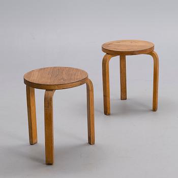 ALVAR AALTO, A PAIR OF STOOLS.