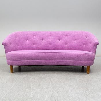 a Carl Malmsten sofa.