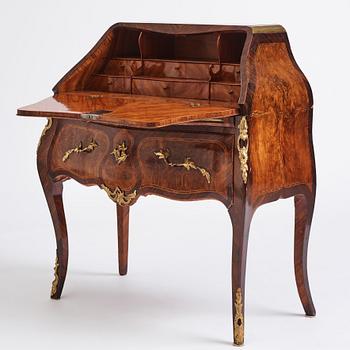 A rosewood, walnut, and gilt brass-mounted rococo secretaire by J. H. Reimers (master in Stockholm 1754-73).