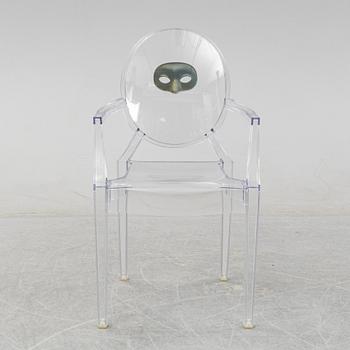 Philippe Starck, a 'Louis Ghost' plastic chair, Kartell, Italy.