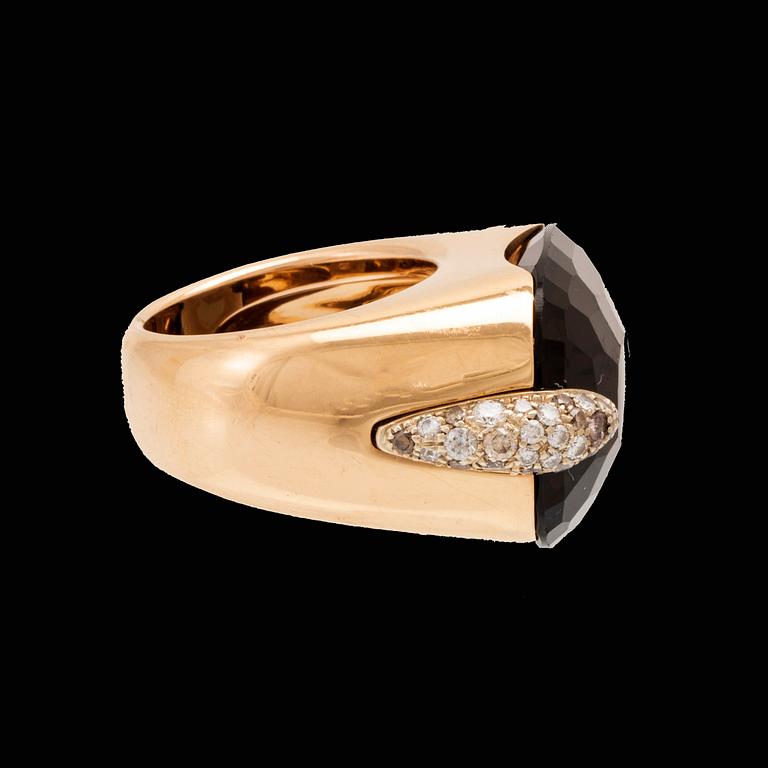 An 18K gold Pomellato "Pin Up" ring set with smoky quartz and round brilliant-cut diamonds.