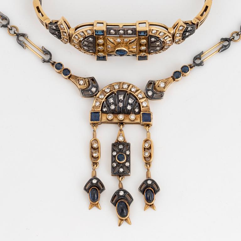 An 18K gold and silver necklace and a bracelet set with diamonds and sapphires.
