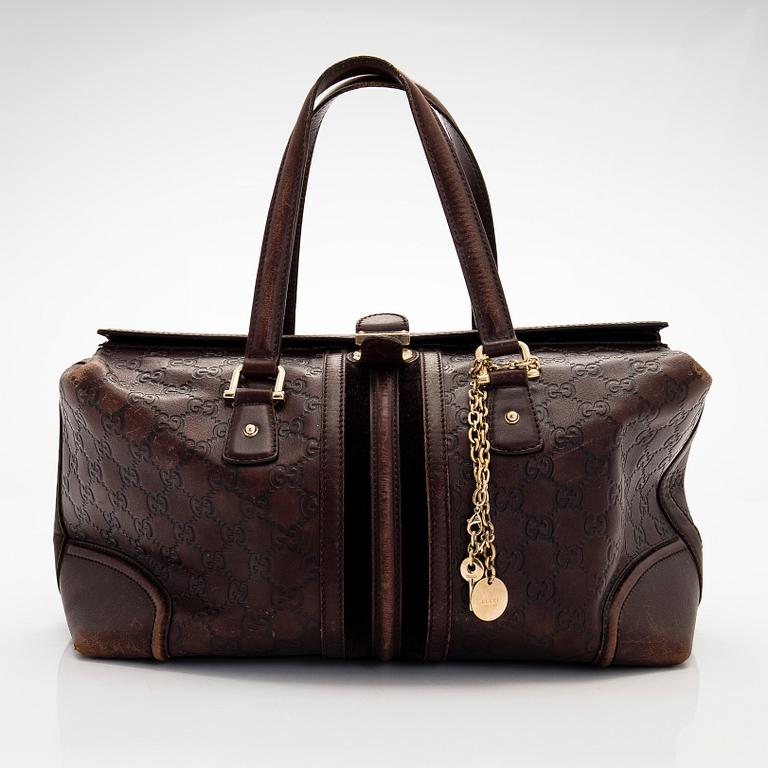 Gucci, A 'Boston' bag.