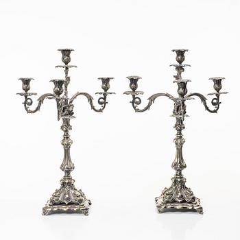 A pair of silver plated Rococo style candelabra, 20th century.