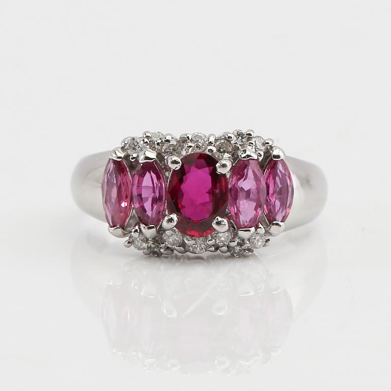 Ring in 850 platinum with navette-cut pink sapphires and round brilliant-cut diamonds.