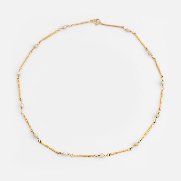 14K gold and pearl bracelet and necklace.