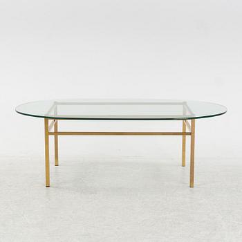 A glass and brass coffee table, Engelsson, Sweden, 21st century.