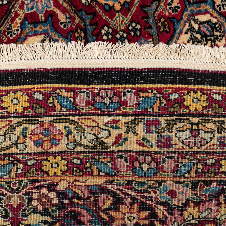 A carpet, semi-antique, Semnan, ca 412 x 304 cm.