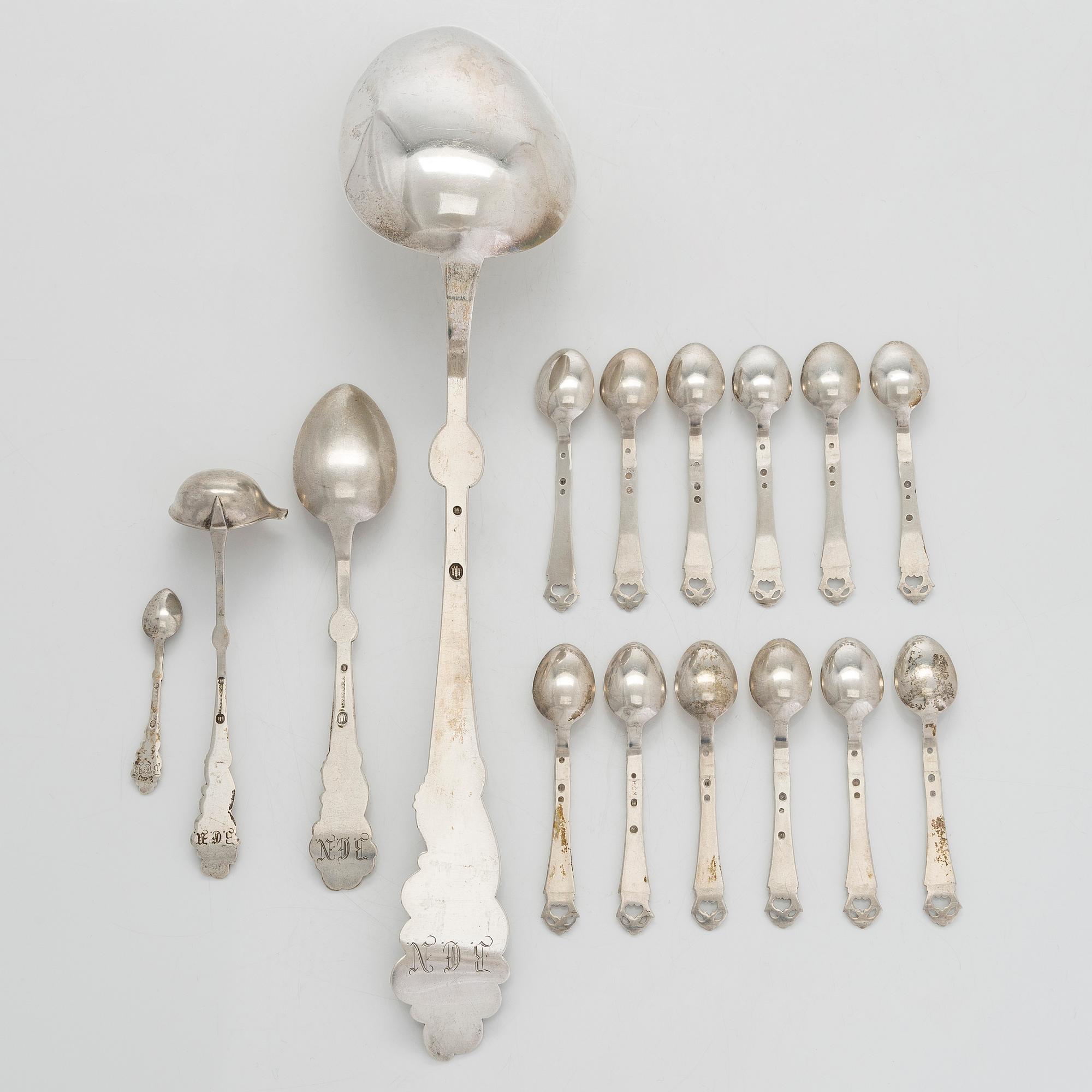 A set of  four silver serving spoons, with a set of 12 coffee spoons, Denmark, early and first half of the 20th century.