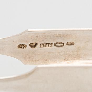 A silver coffee pot, sugar bowl, cream jug, and sugar tongs, Finland 1926-49.