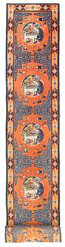 An antique Ningxia runner, north west China, c 763 x 72 cm.