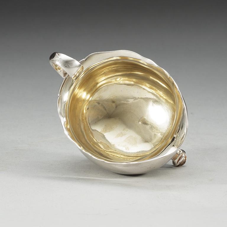 A Swedish 18th century parcel-gilt cream-jug, makers mark of Henrik Wittkopf d.ä., Stockholm 1747.