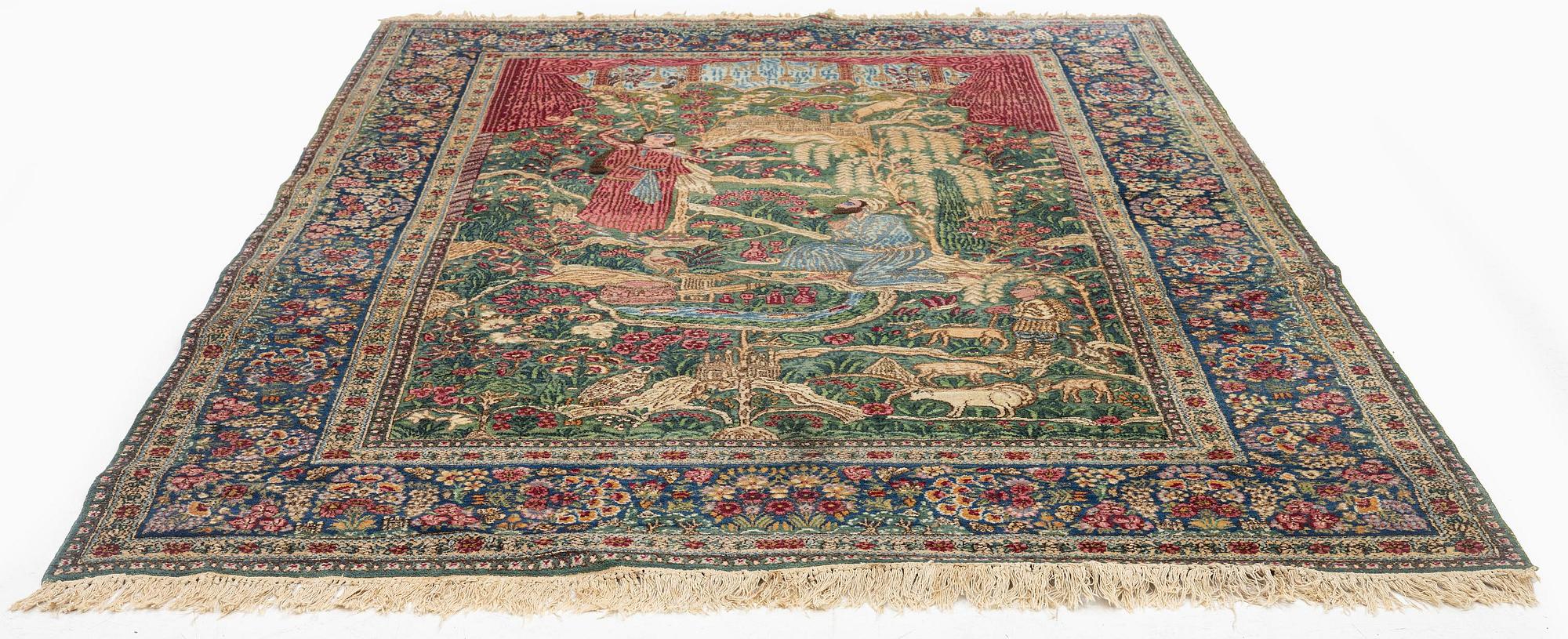 A semi-antique pictoral Kirman Lavar rug, Southeastern Persia (Iran), c. 236 x 156 cm.
