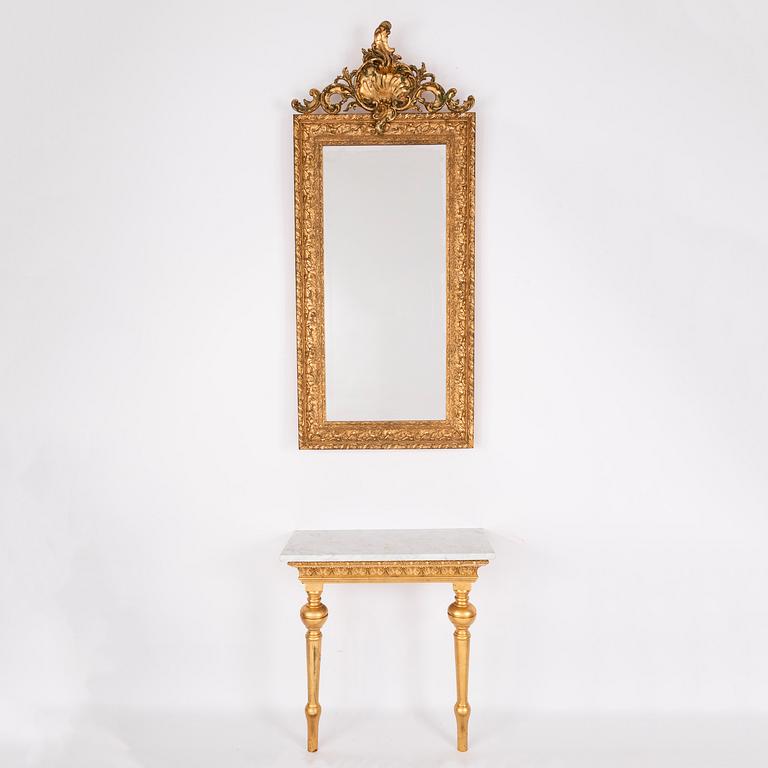 A mirror and a console table, around the year 1900.