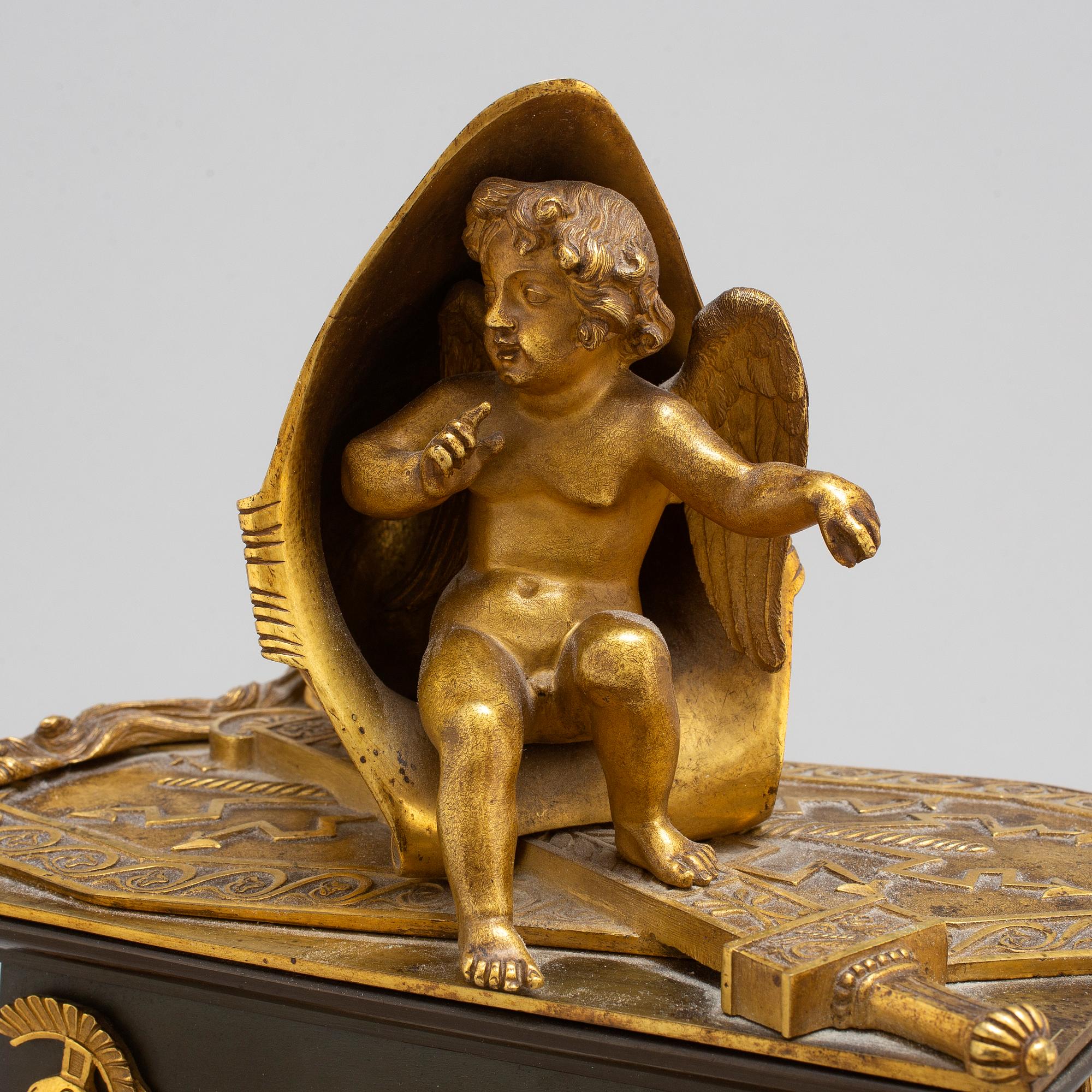 A French Empire early 19th century mantel clock.