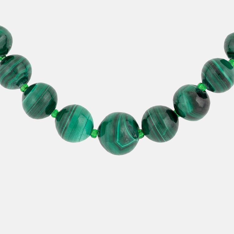 A malachite bead necklace.