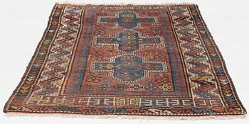 A semi-antique/antique Kazak rug, c. 200 x 120 cm.