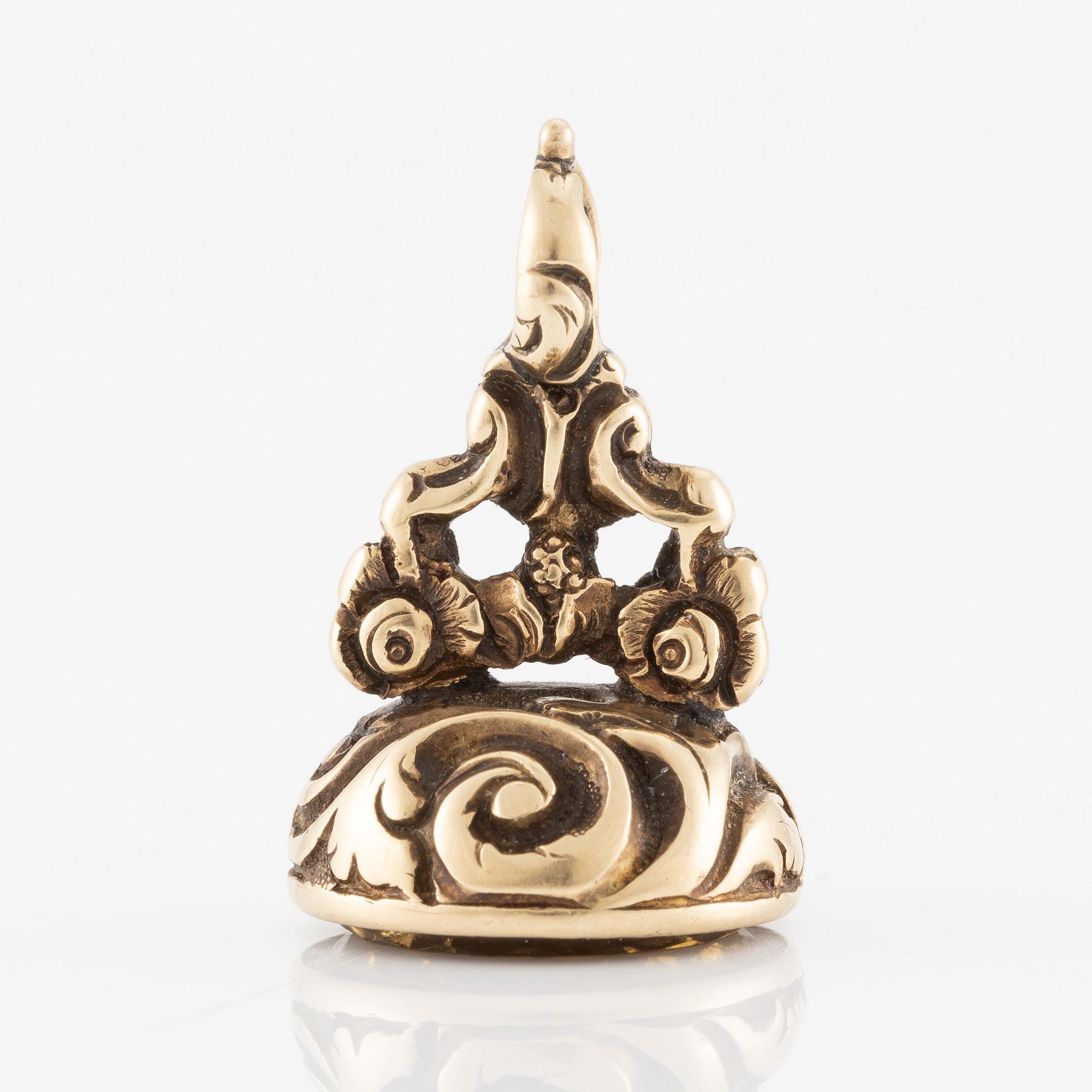 Sigill 14K guld och graverad gulaktig sten, möjligen citrin.