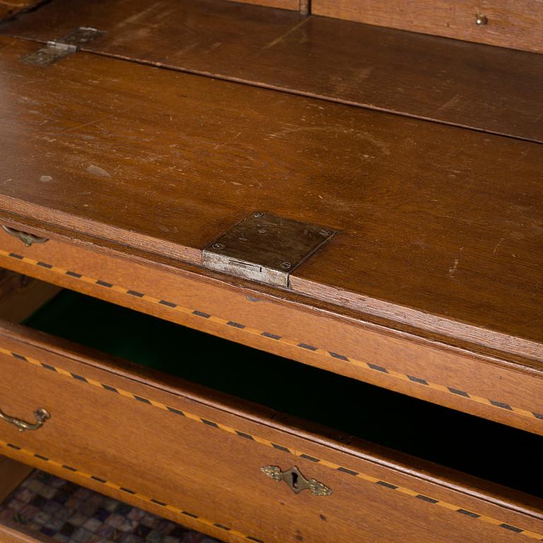 A writing cabinet, probably from Småland, first half of the 19th century.
