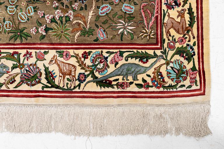A silk Qum rug, central Persia, c. 213 x 135 cm.