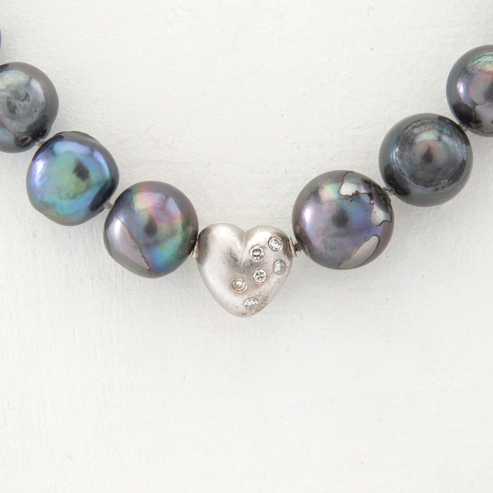 Ole Lynggaard, Lock 18K white gold with accompanying necklace of cultured pearls.