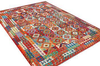 A Kilim carpet, c. 371 x 261 cm.