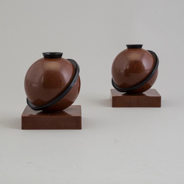 a pair of bakelite 'Saturnus' candle lights.