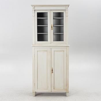 A display cabinet, early 20th century.