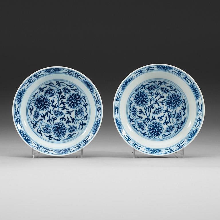 A pair of blue and white lotus dishes, Qing dynasty, Guangxu mark and period (1874-1908).