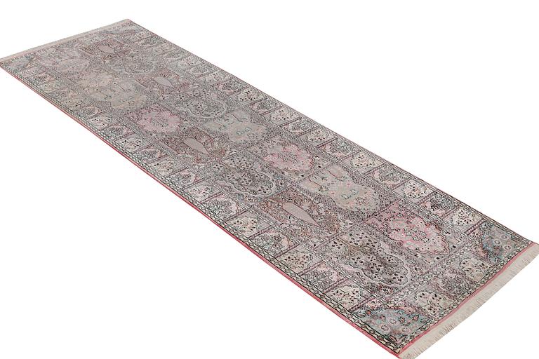 A Kashmir runner carpet, silk, c. 364 x 97 cm.