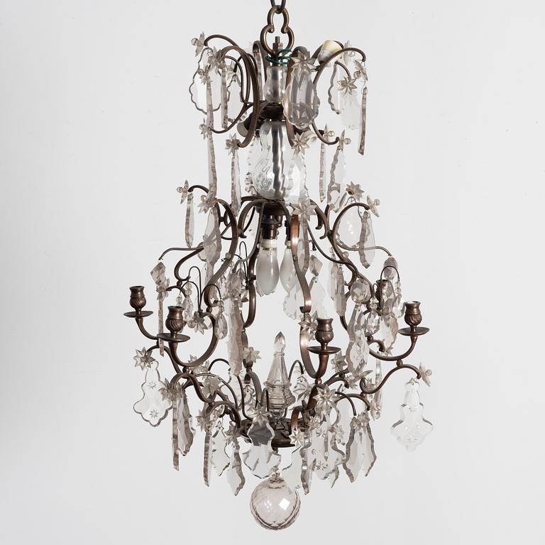 A Rococo style chandelier, early 20th century.