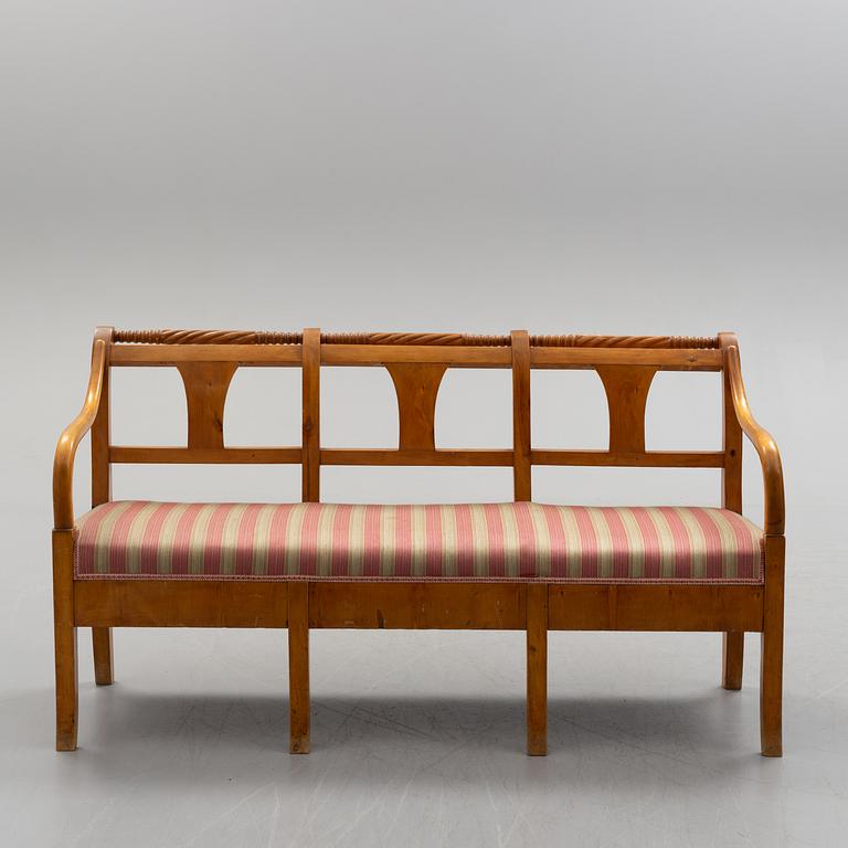 A first half of teh 19th century birch sofa.