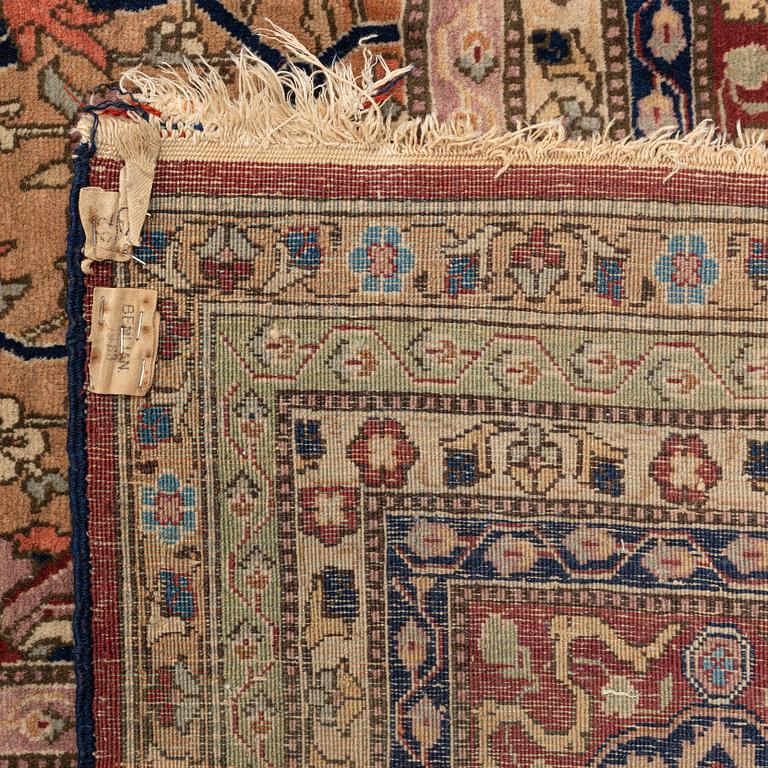 A carpet, semi-antique, Benlian Tabriz, signed Jabarzade, ca 466 x 328,5 cm.