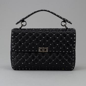 A bag by Valentino, "Rockstud Spike".