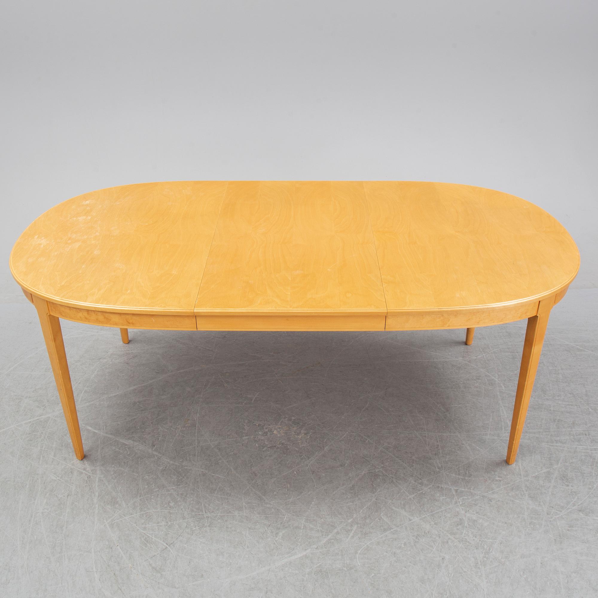 Carl Malmsten, a set of six 'Ambassadör' chairs and a 'Herrgården' dining table, second half of the 20th Century.