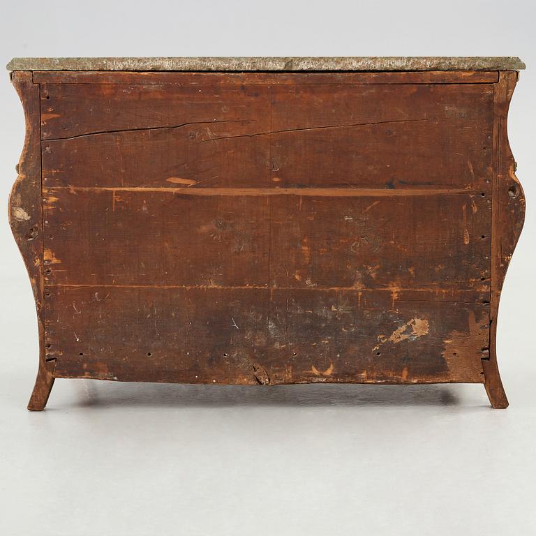 A Swedish Rococo chest of drawers by Christian Linning dated 1761 (master in Stockholm 1744-1779).