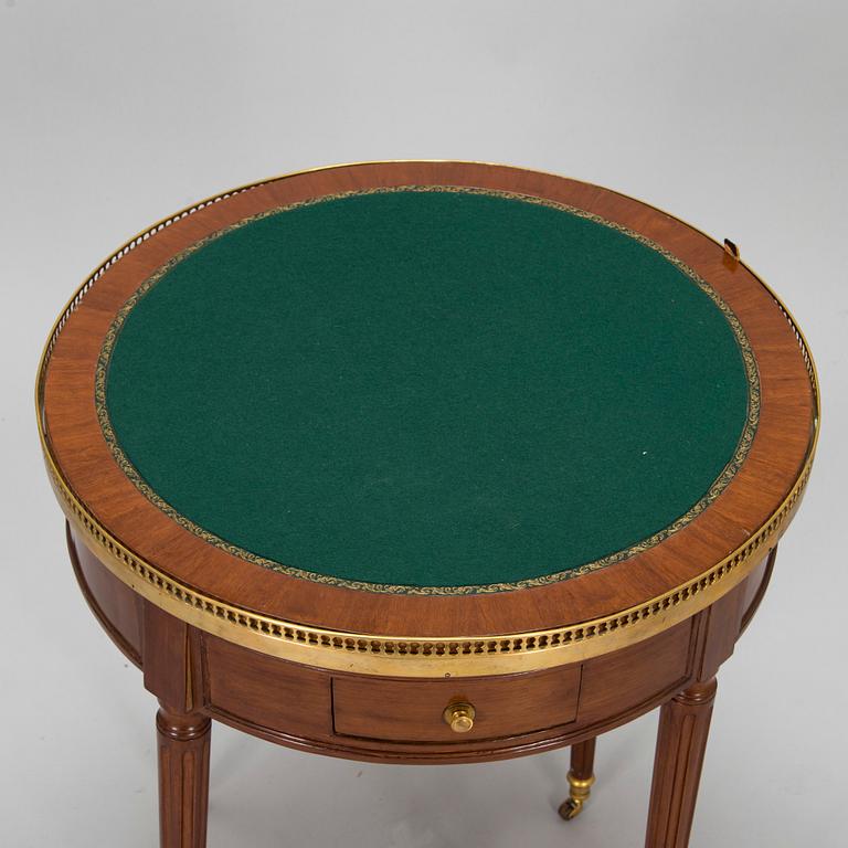 A directoire style coffee table/game table, 19th century.