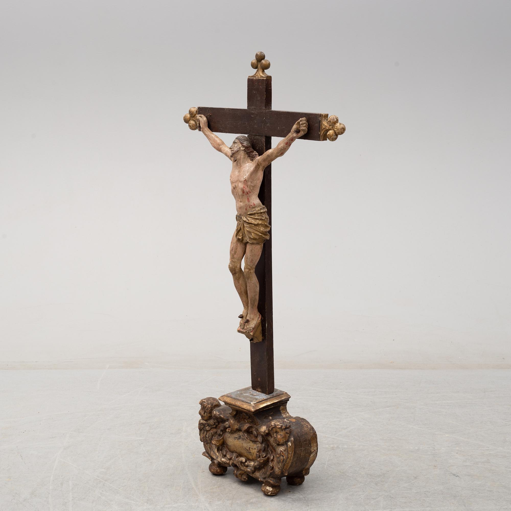 A 17TH CENTURY WOODEN CRUCIFIX, baroque.