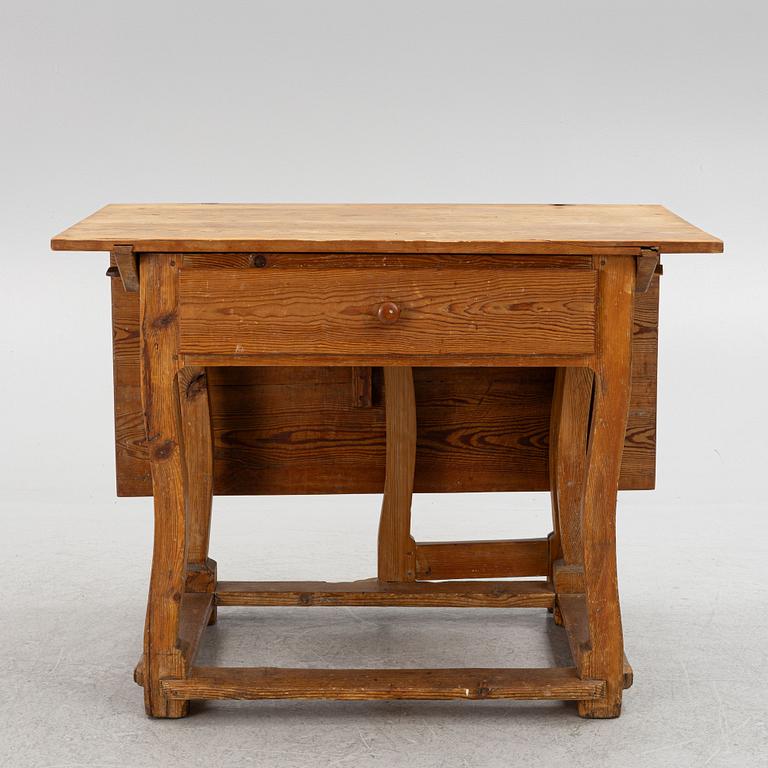 A 18th century gate-leg table.
