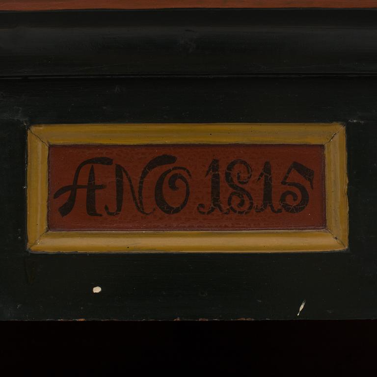 A corner cabinet from the first half of the 19th century.