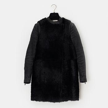 Céline, a sheep skin coat, size 36.