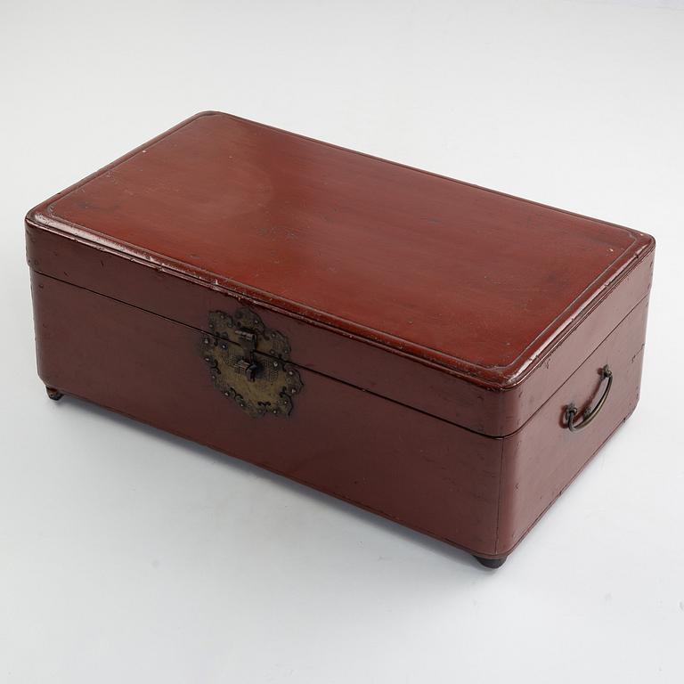 A Korean wooden wedding chest, two hats, an opium pipe, a scale, circa 1900.