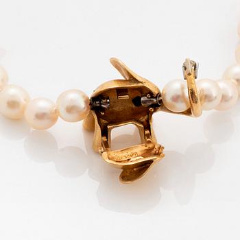 Ole Lynggard lås 18K guld med en rund briljantslipad diamant.