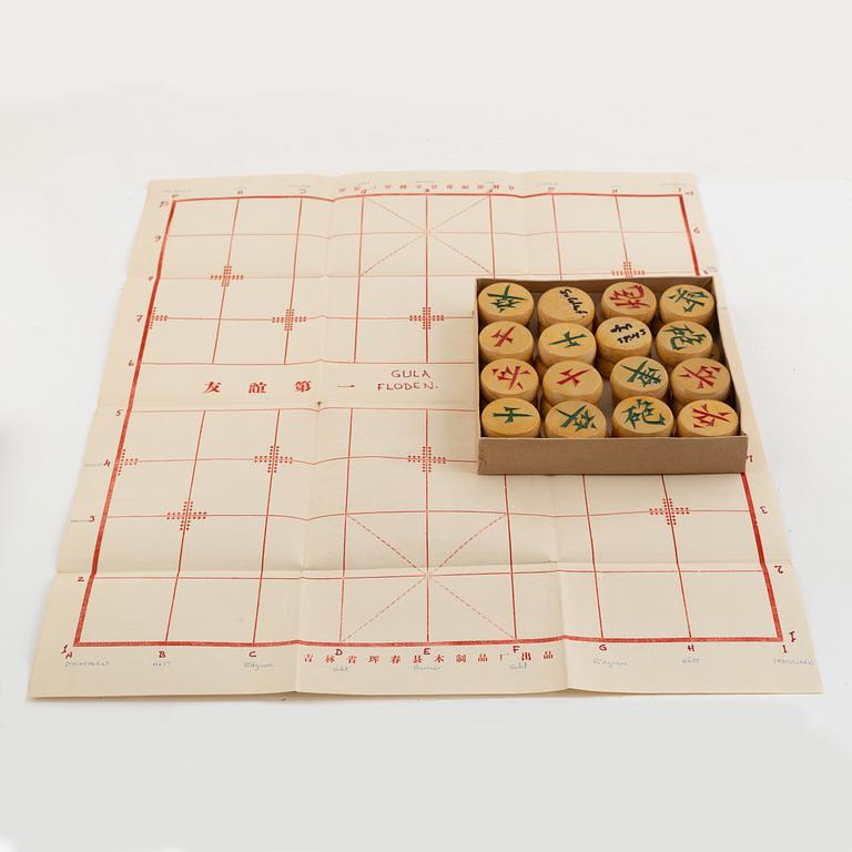 A set of six Chinese ink rubbings, two board games and a box with glass pearl embroidery.