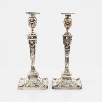 a pair of Louis XVI style silver candle sticks, Vienna, Austria, around 1900.