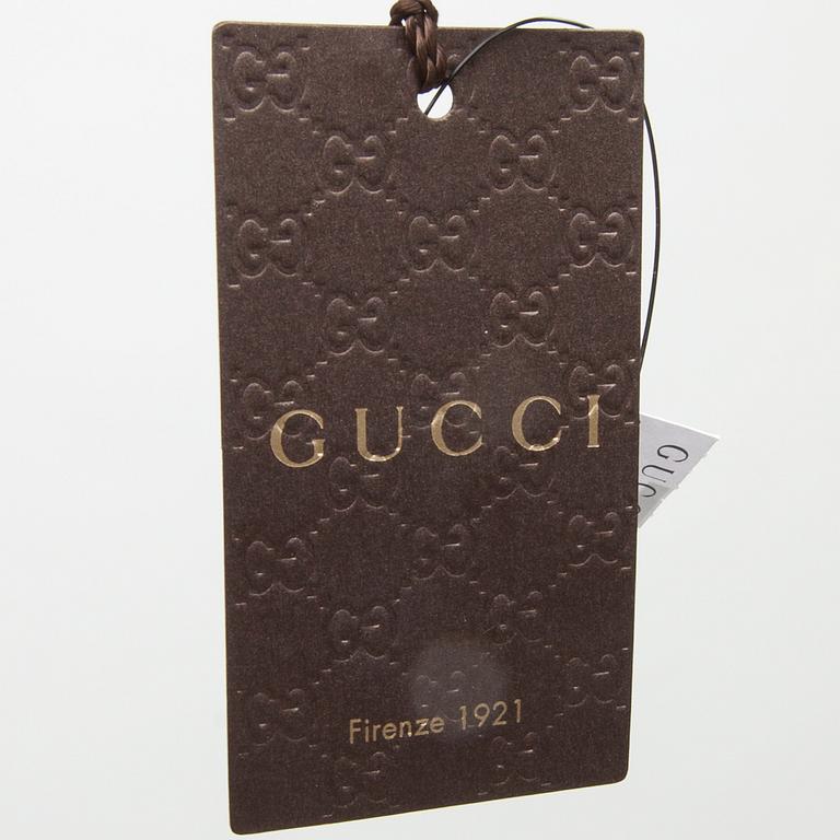 TOPP, Gucci.