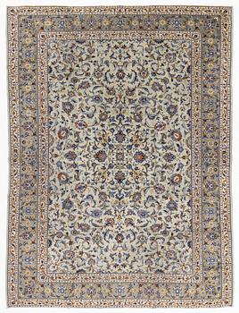 A Kashan carpet, approximately 368 x 280 cm.