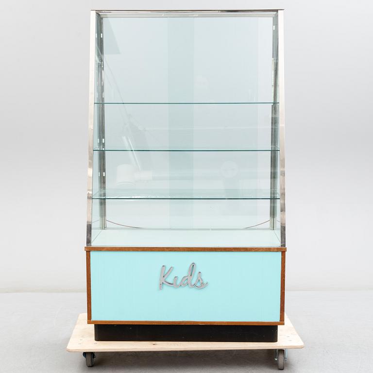 A second half of the 20th Century display cabinet for a shop.