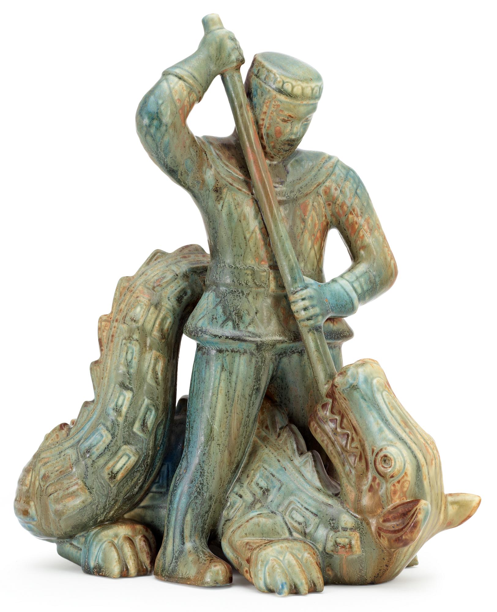 A Gunnar Nylund stoneware sculpture of S:t Michael and the dragon, Rörstrand.