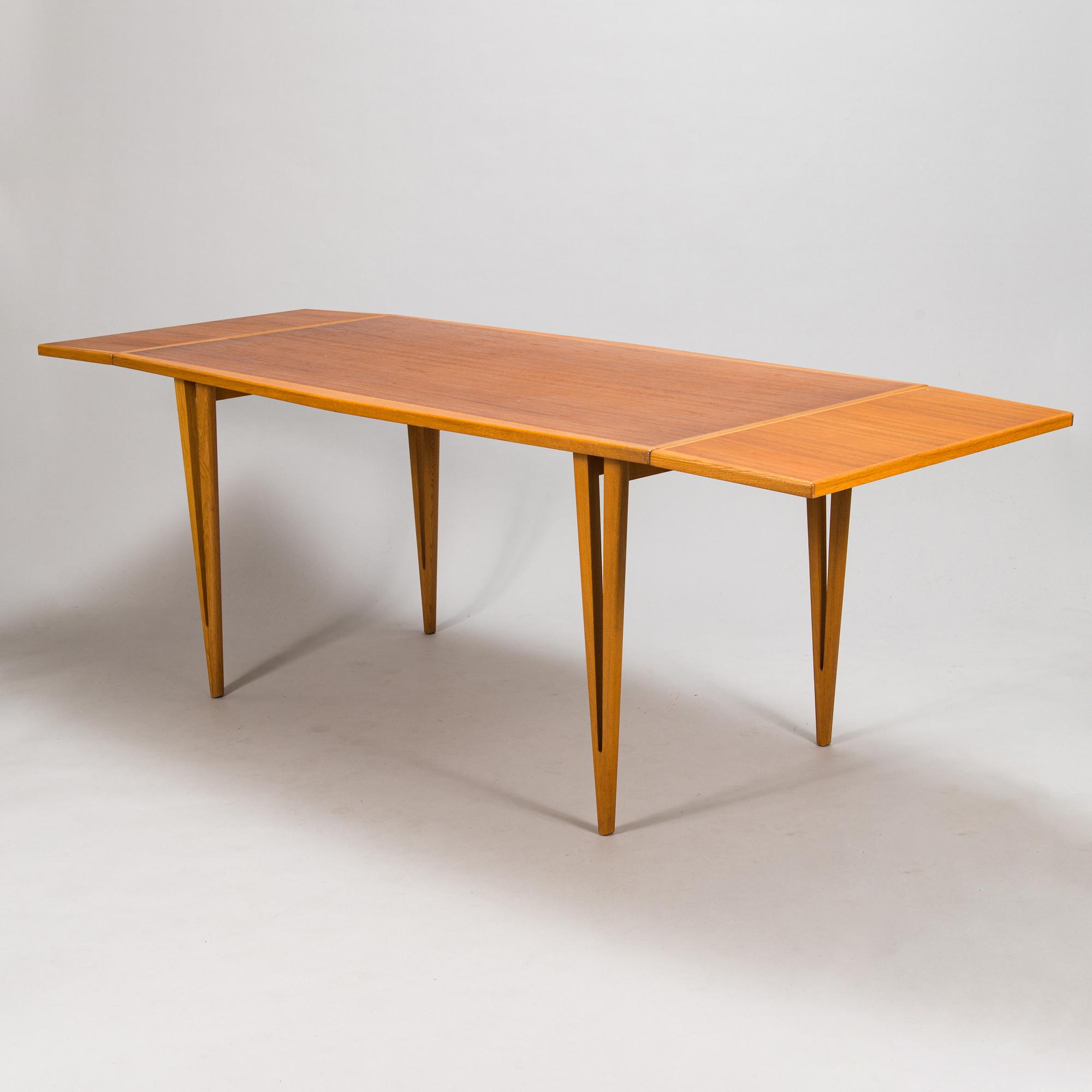 A mid-20th century dining table.